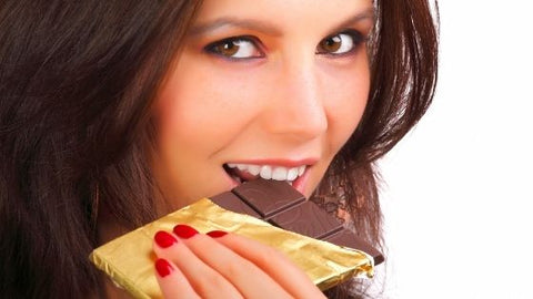 Woman Eating Chocolate